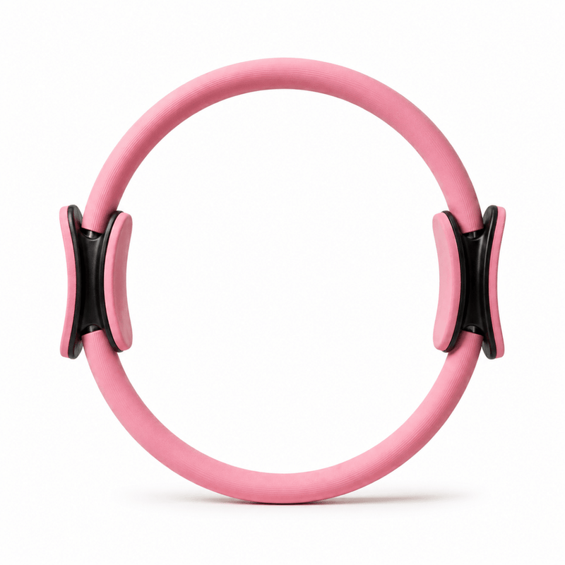 Pink Lyvae Pilates Ring magic circle on a white background.